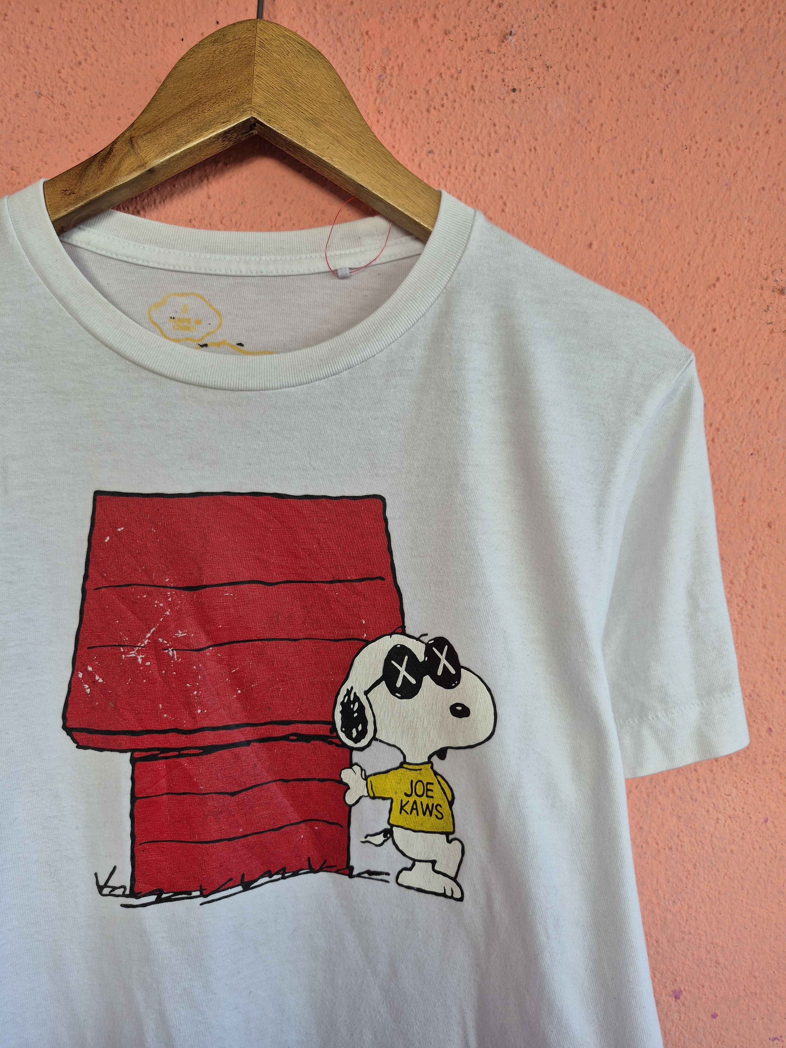 Kaws × Peanuts × Uniqlo 🔥 Uniqlo Kaws Peanuts Snoopy Cartoon Tee Size US S / EU 44-46 / 1 - 2 Thumbnail