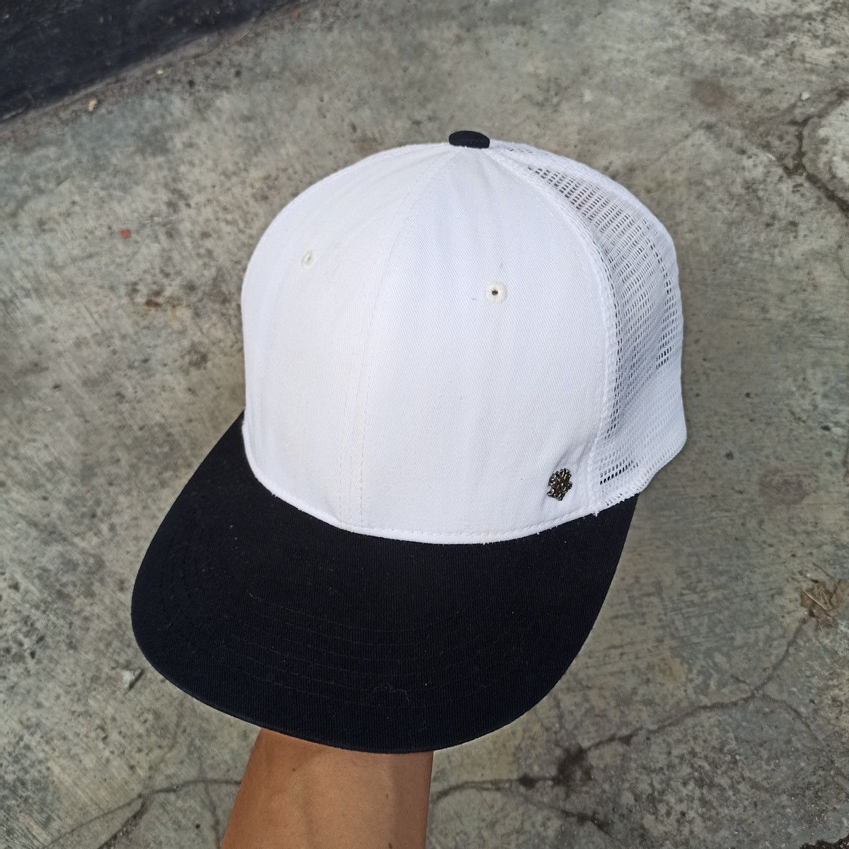 SICK oversize trucker hat by mqum with gothic logo pin
