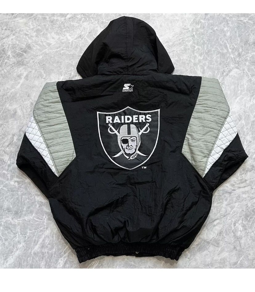 image of Vintage 90's Starter Raiders Puffer Jacket in Black/White, Men's (Size XL)