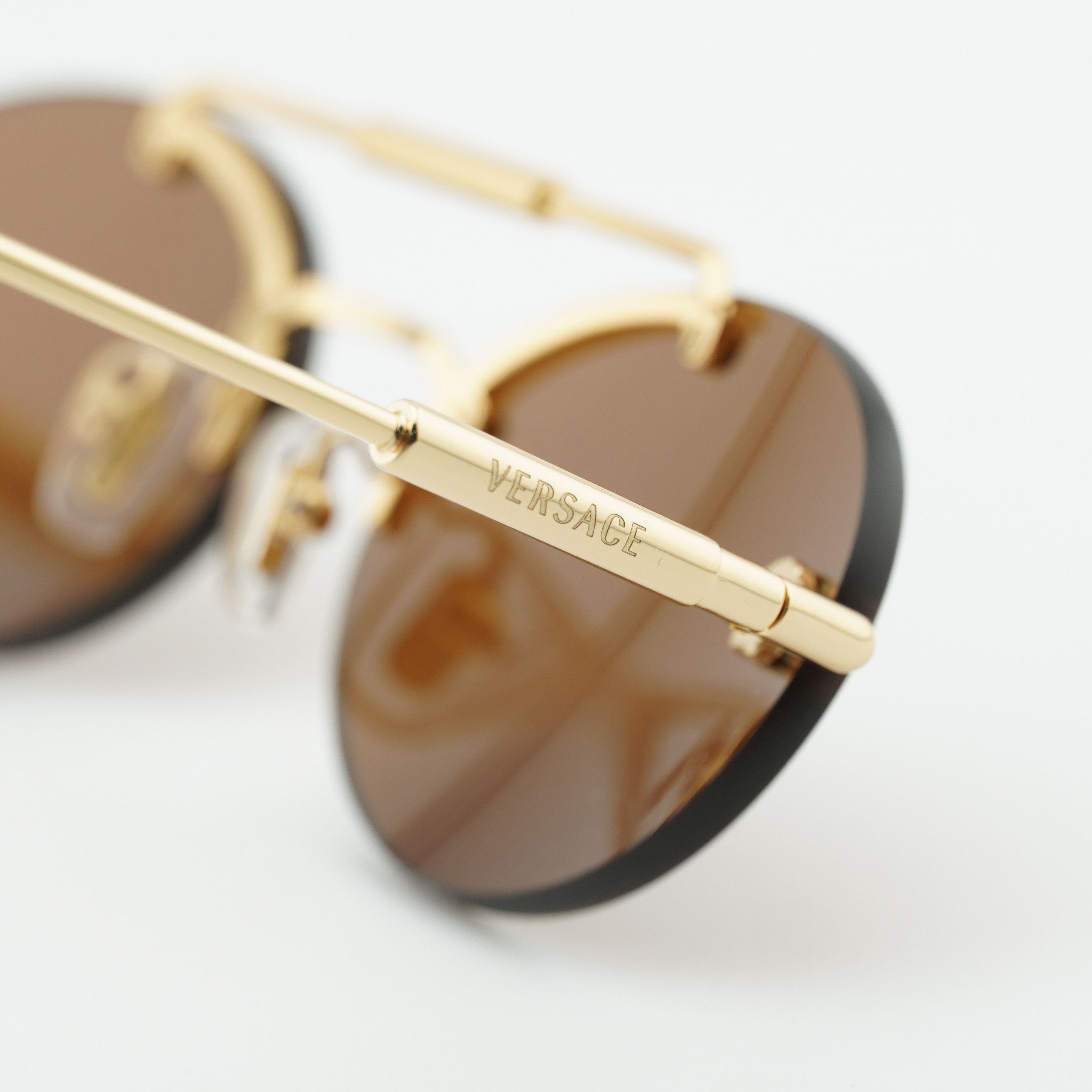 Versace Versace VE2295 1002/73 Sunglasses Gold Oval Frame Size ONE SIZE - 9 Thumbnail