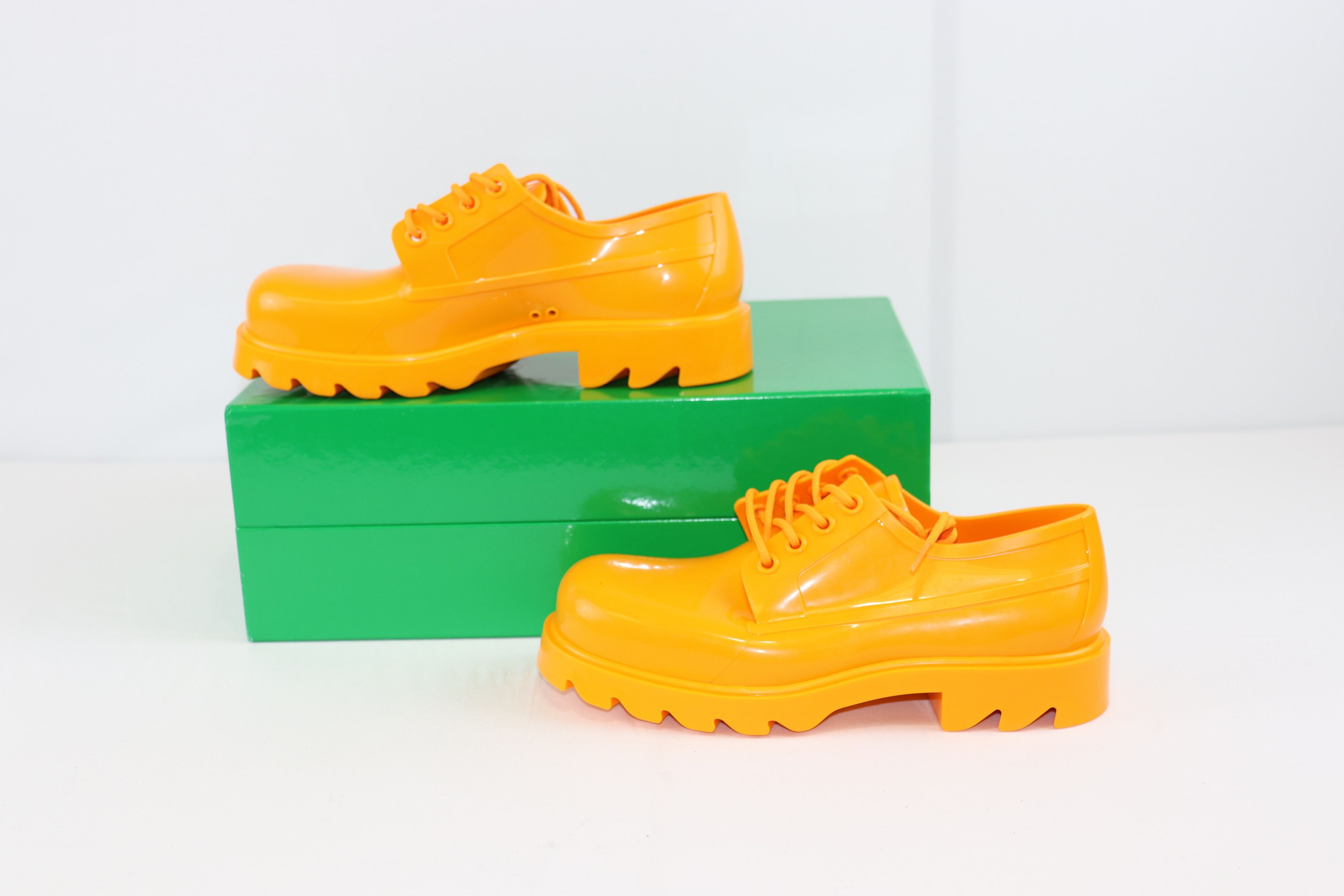 image of Bottega Veneta O1Rshd1 Shiny Lace Up Rubber In Tangerine Shoes, Men's (Size 9)