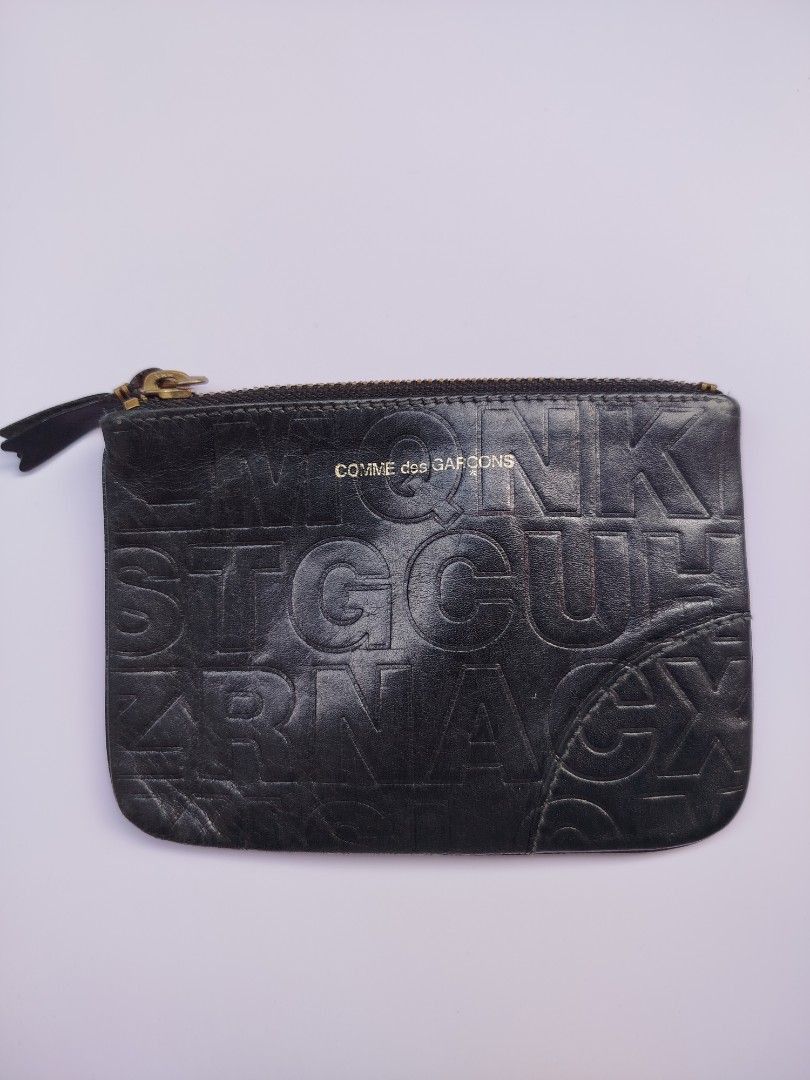 Comme des Garçons black leather coin purse/small zip pouch.