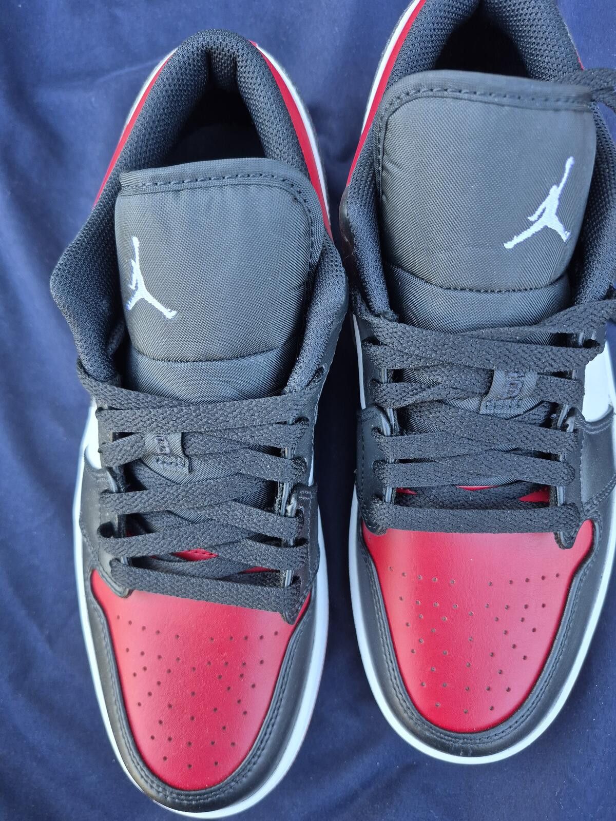 Jordan Brand Air Jordan 1 Low silhouette in a black, white, and red 9 M Size US 9 / EU 42 - 7 Thumbnail