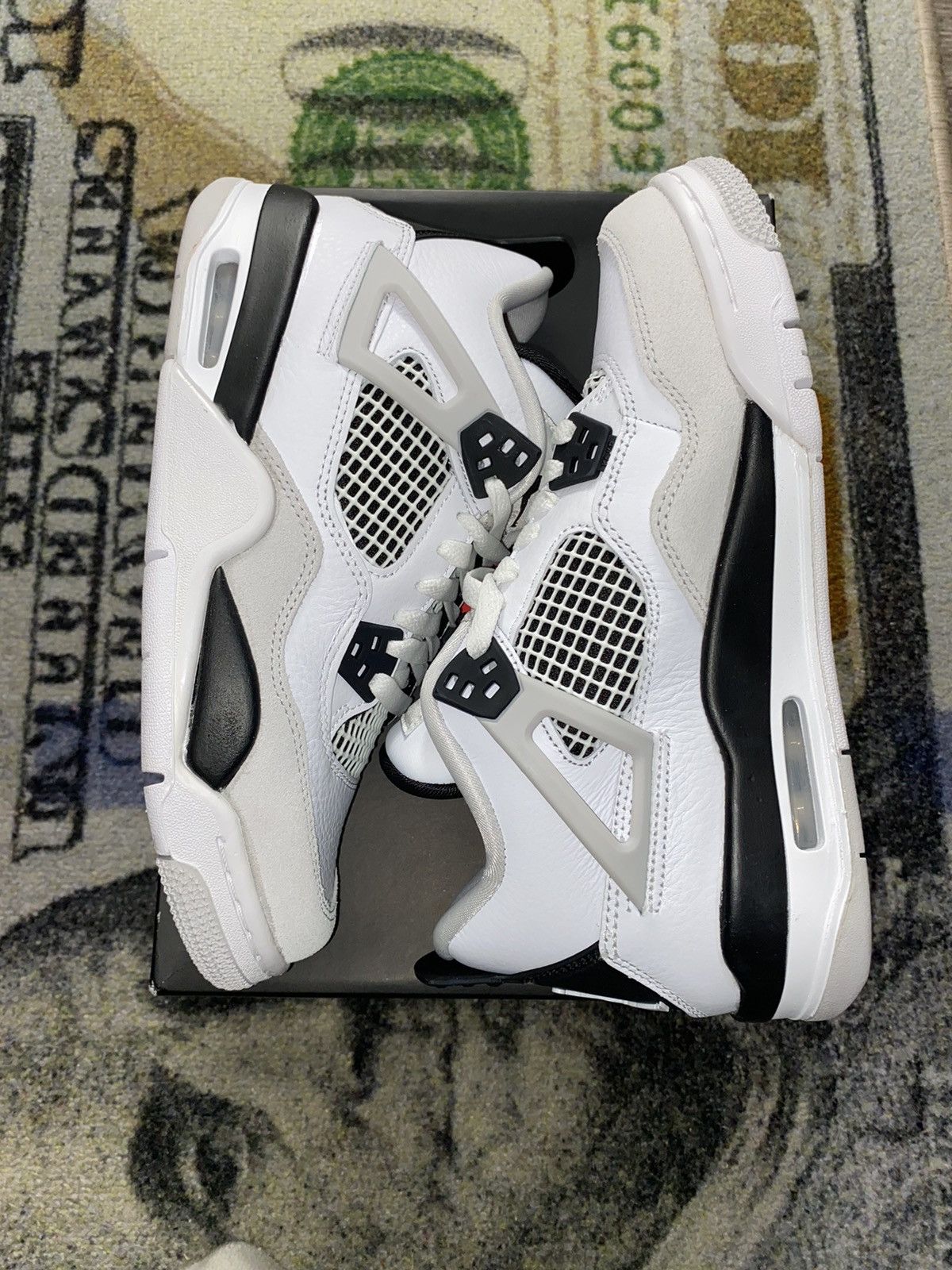 image of Jordan Nike Jordan 4 Retro Military Black (6.5Y Grade School) Shoes in White Black Grey, Women's (S