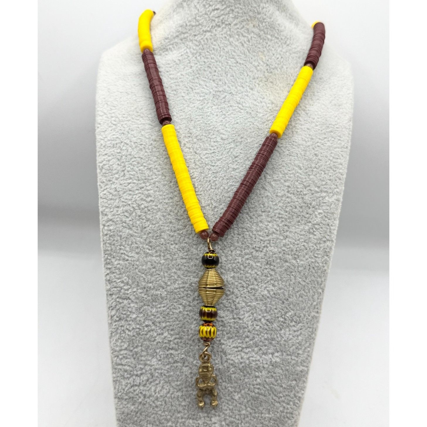 Vintage Vintage yellow brown record bead Aztec man pendant charm nec Size ONE SIZE - 1 Thumbnail
