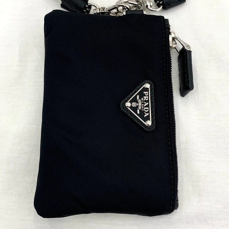 Prada PradaWhite triangle label hanging neck bag cotton round-nec Size US S / EU 44-46 / 1 - 6 Thumbnail