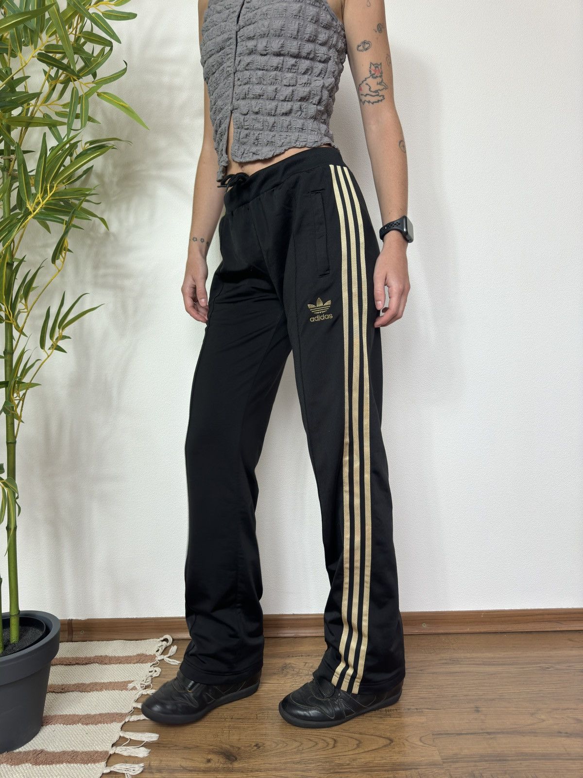 Adidas gold and black pants on sale