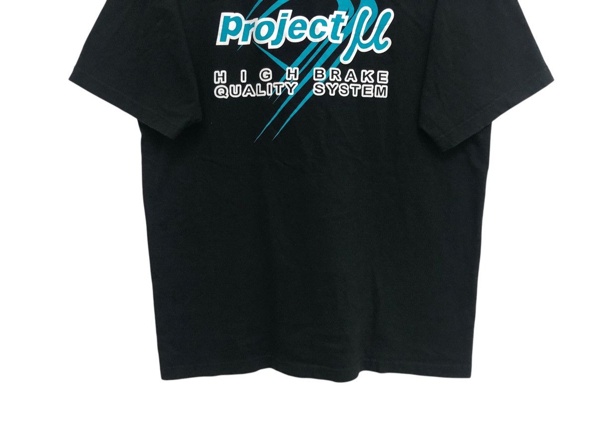 Sports Specialties × Vintage RARE 🔥 PROJECT MU RACING PAD PROMO TEE JDM STYLE RARE Size US L / EU 52-54 / 3 - 8 Thumbnail