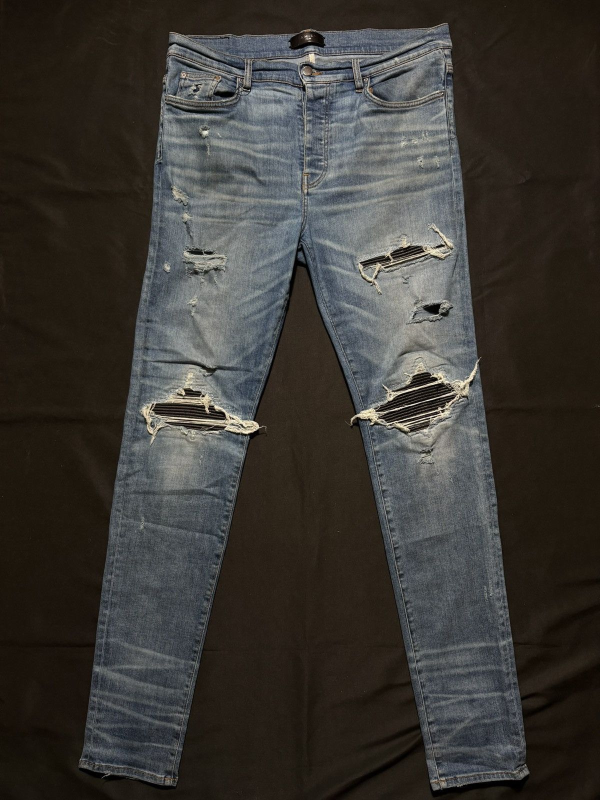 Amiri Amiri MX1 Light Wash Black Patch Jeans - Size 38 Size US 38 / EU 54 - 1 Thumbnail