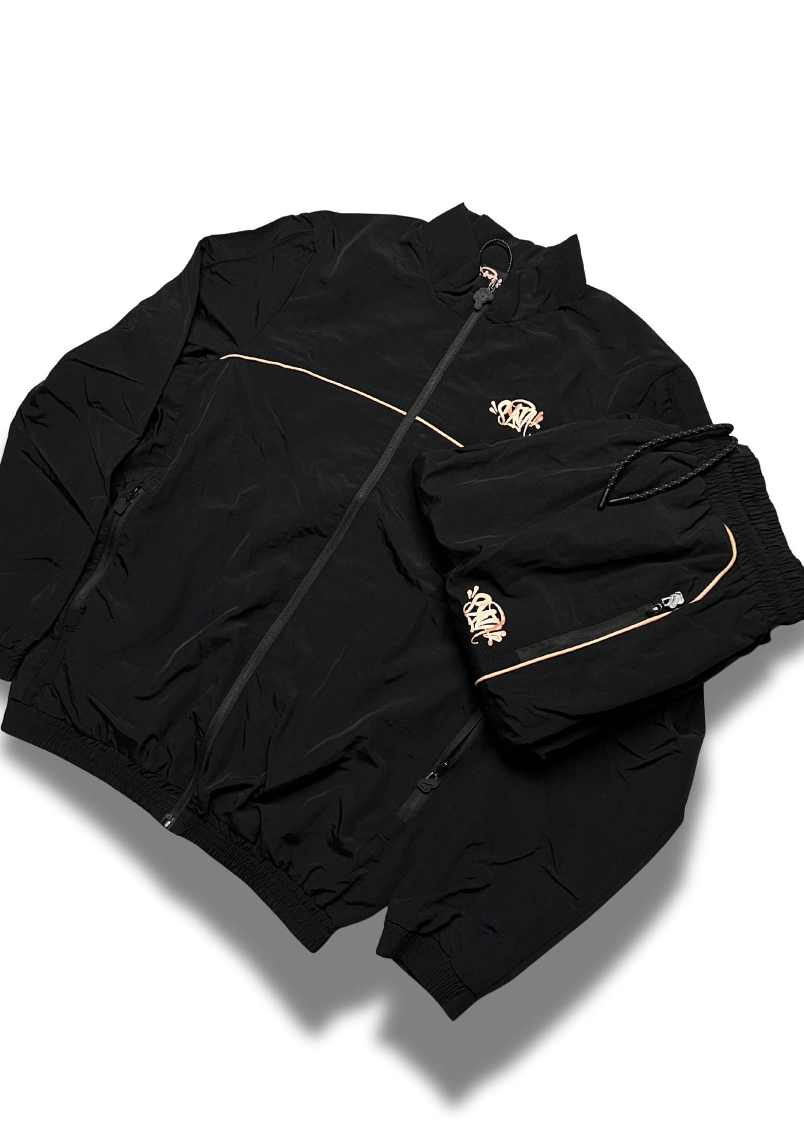 Syna World Syna World Shell Tracksuit “BLACK / GOLD” CHECK Description Size US S / EU 44-46 / 1 - 3 Thumbnail