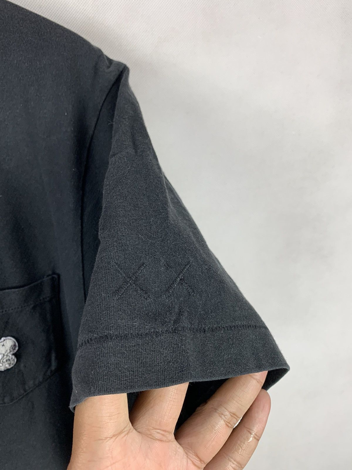 Kaws × Peanuts × Uniqlo Offer! Peanuts Snoopy Kaws Uniqlo Pocket Tee Streetwear Size US L / EU 52-54 / 3 - 3 Thumbnail