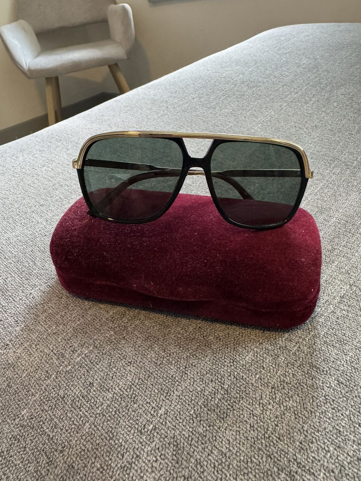 Black and Gold Gucci aviator frames