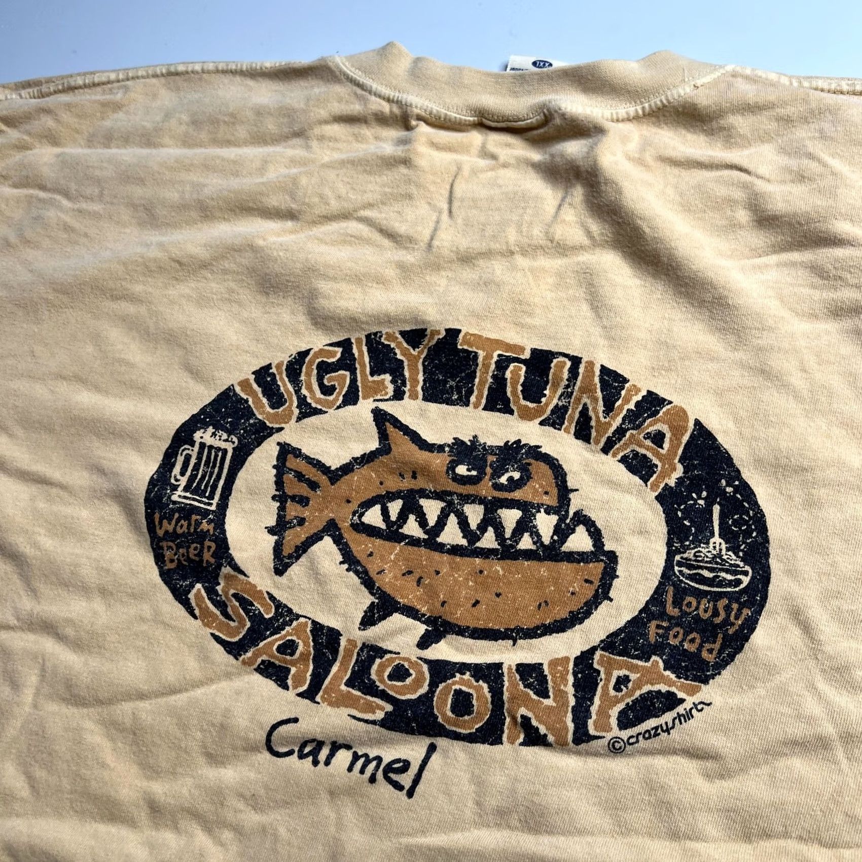 Vintage VINTAGE Crazy Shirts Shirt Mens 2XL Beige Ugly Tuna Saloona Carmel Beer Fish Graphic Tee Size US XXL / EU 58 / 5 - 7 Thumbnail