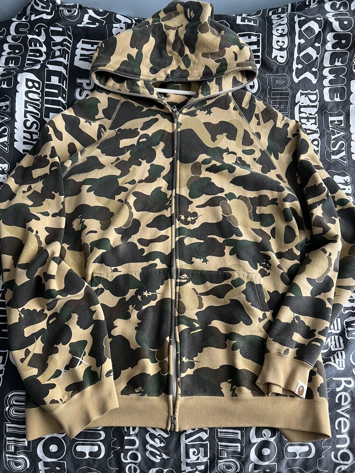 Bape × Kaws Bape x Kaws 1st Camo Bendy Full Zip Hoodie | Grailed