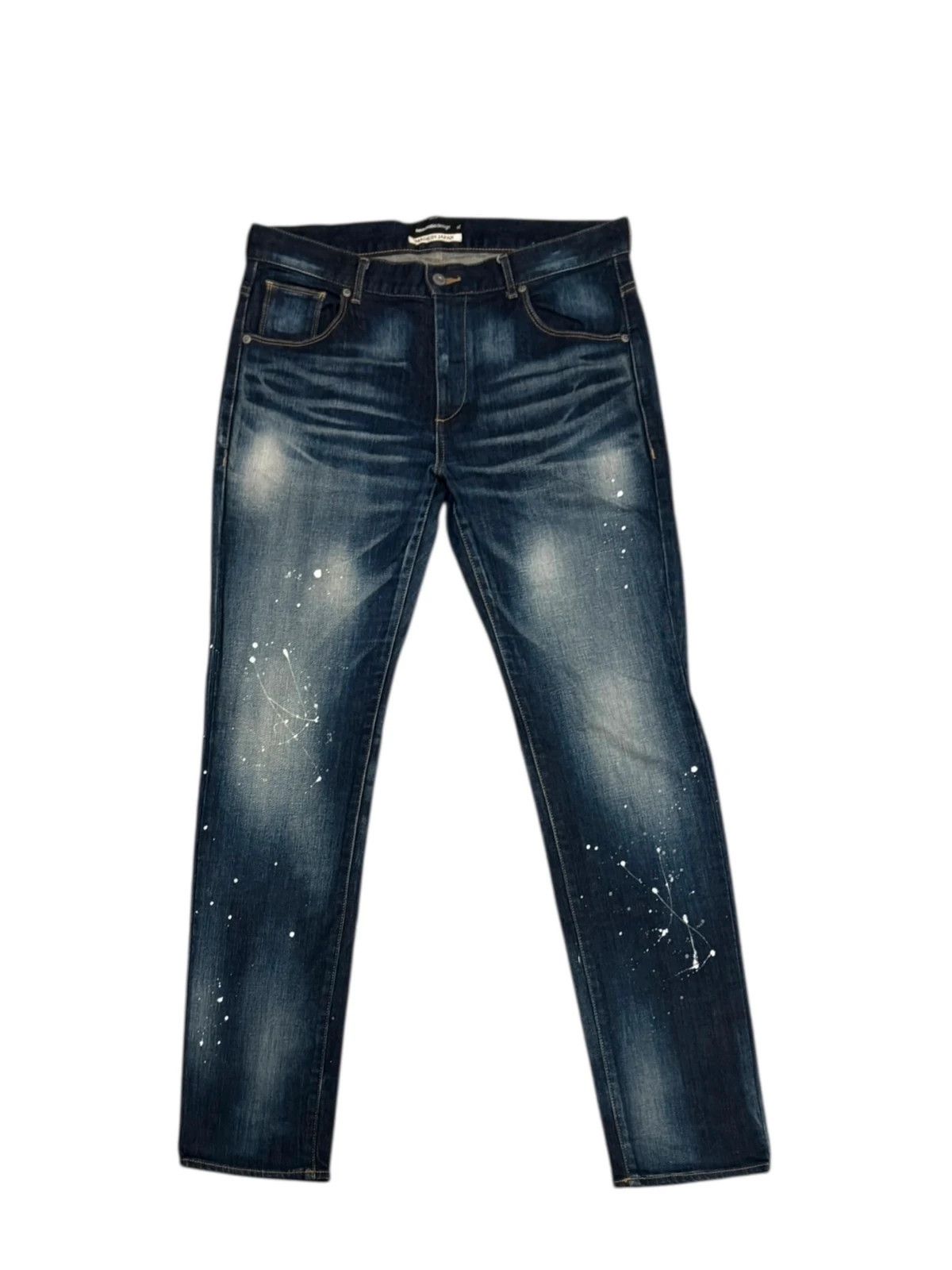Semantic Design blue paint splatter denim jeans
