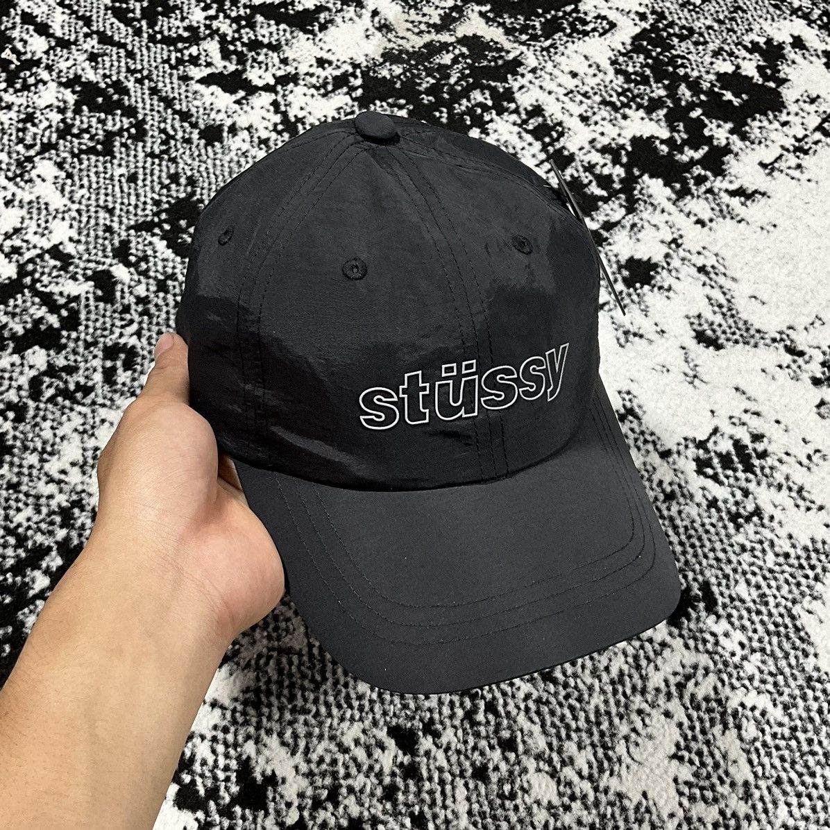 STUSSY NYLON REFLECTIVE CAP IN BLACK