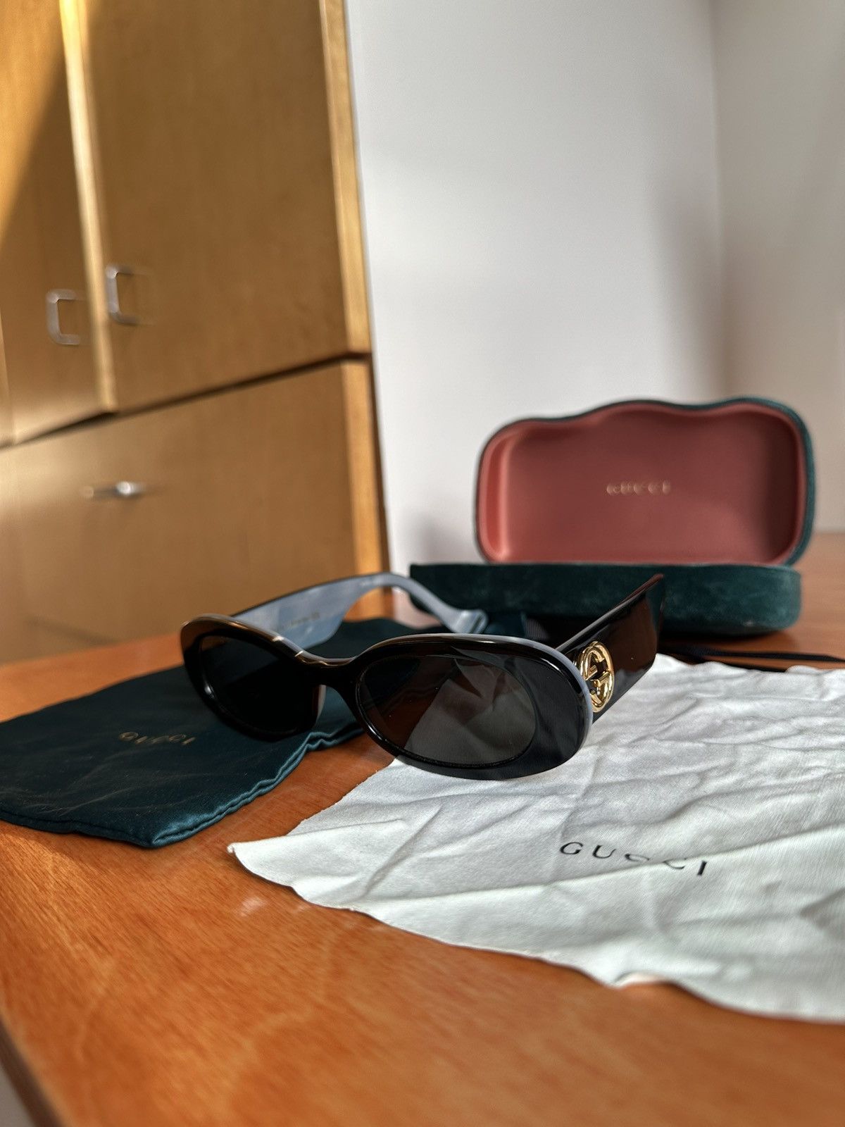 image of Gucci Black Oval Sunglasses, Men's