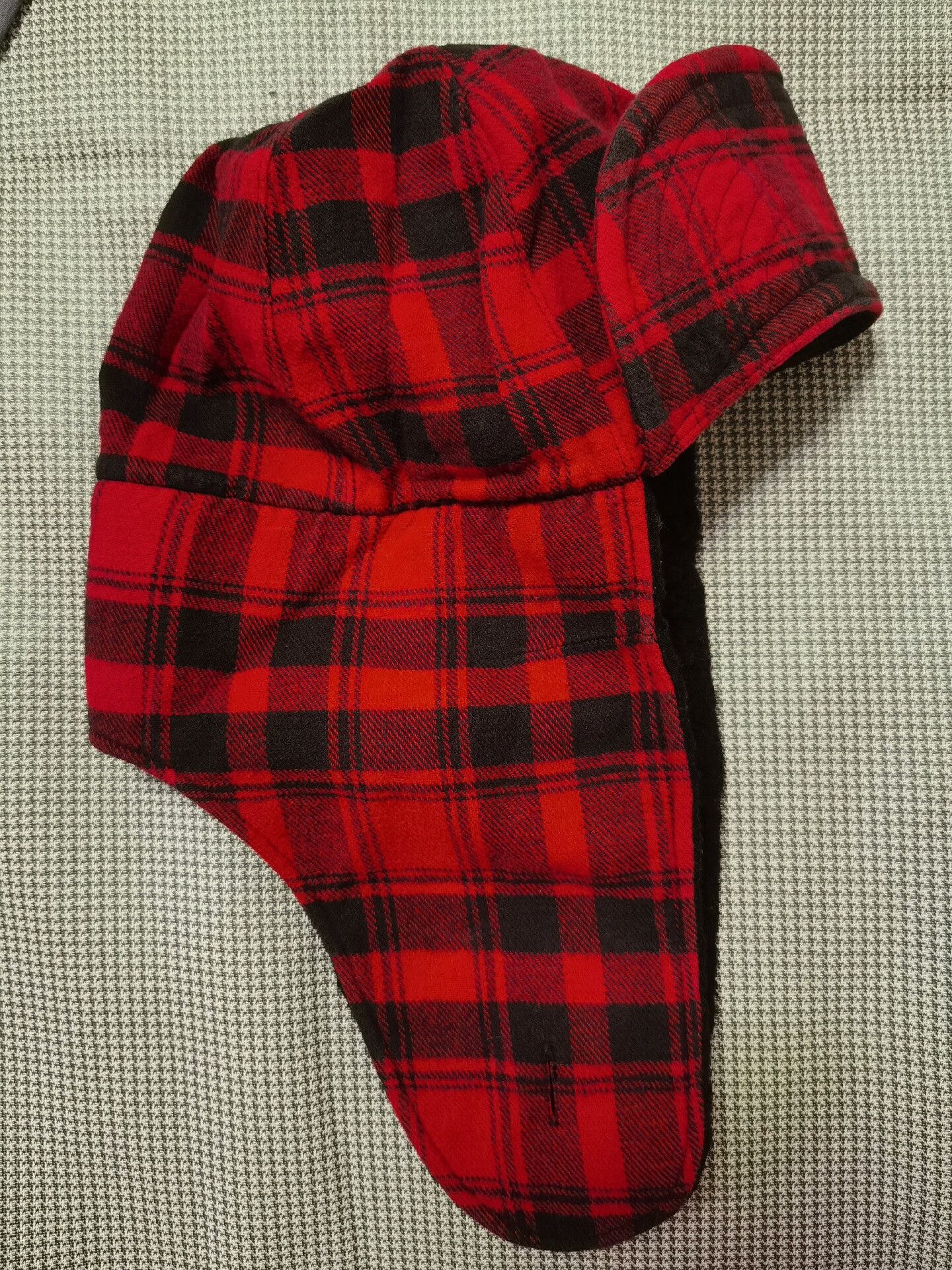 red plaid flying hat with ear flaps