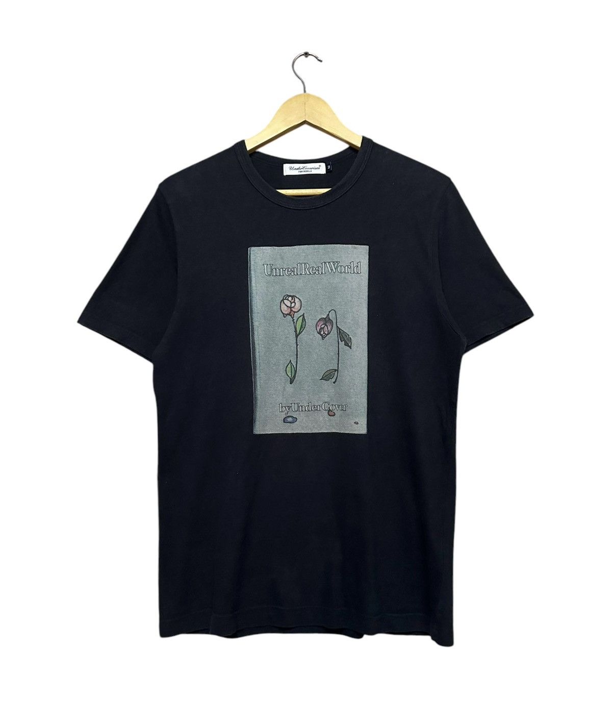 Unreal Real World By Undercover Tee