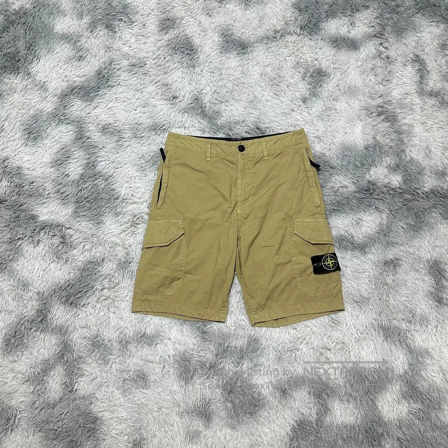 Stone Island khaki cargo shorts by stone island. Size US 31 - 1 Thumbnail