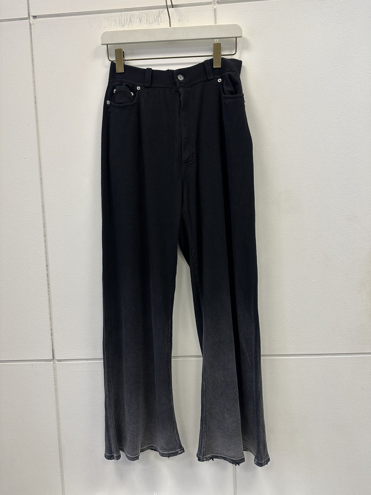 Distressed-effect trousers