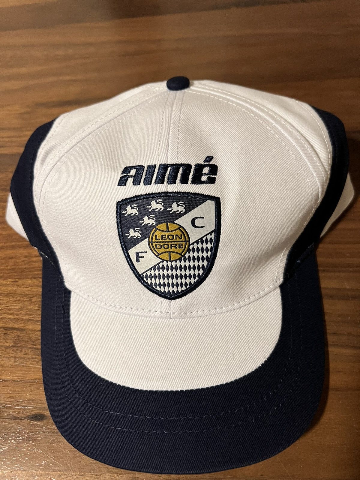 Aime Leon Dore Aime Leon Dore ALD Team Leon Logo Soccer Hat Cap White/Navy Size ONE SIZE - 2 Thumbnail