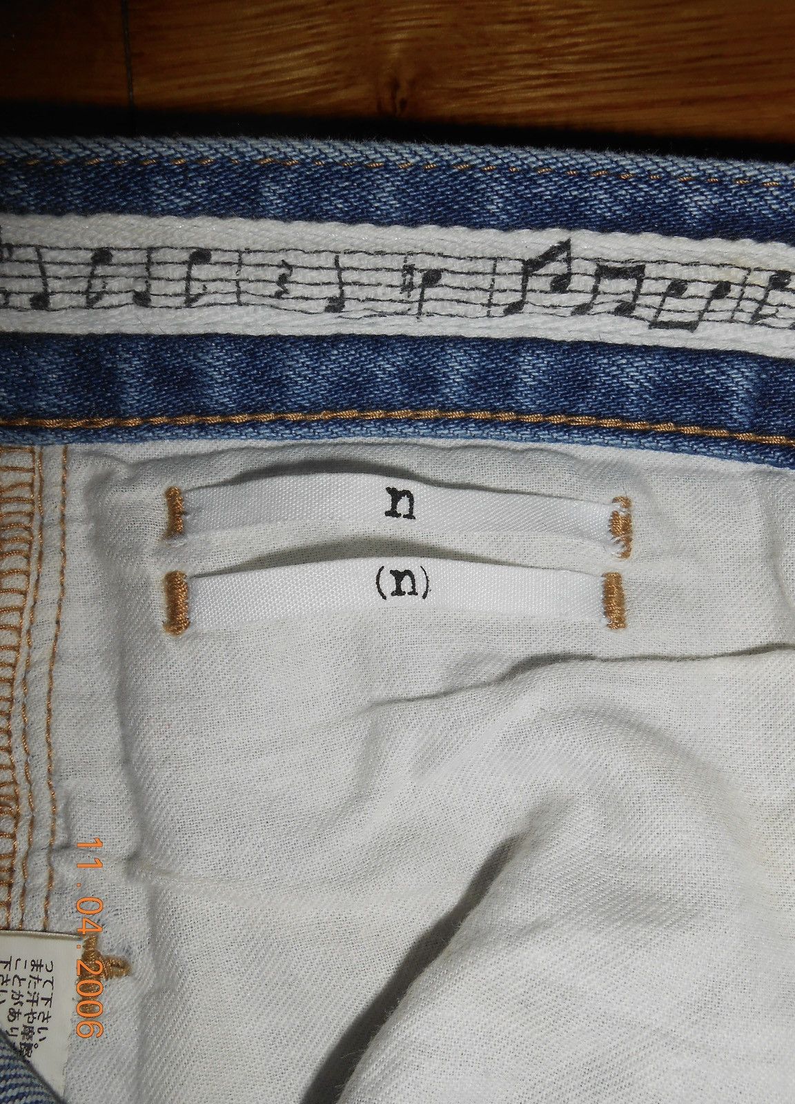 number (n)ine distressed repair denim