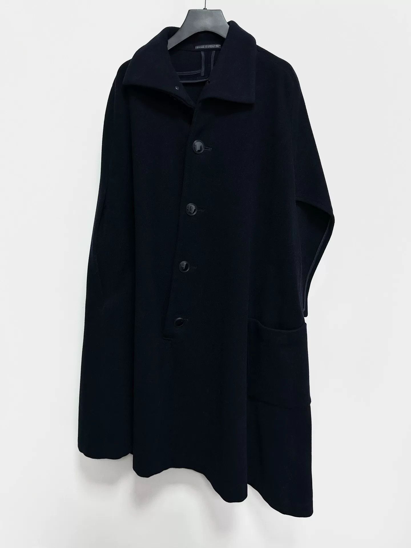 yohji yamamoto asymmetrical coat in black