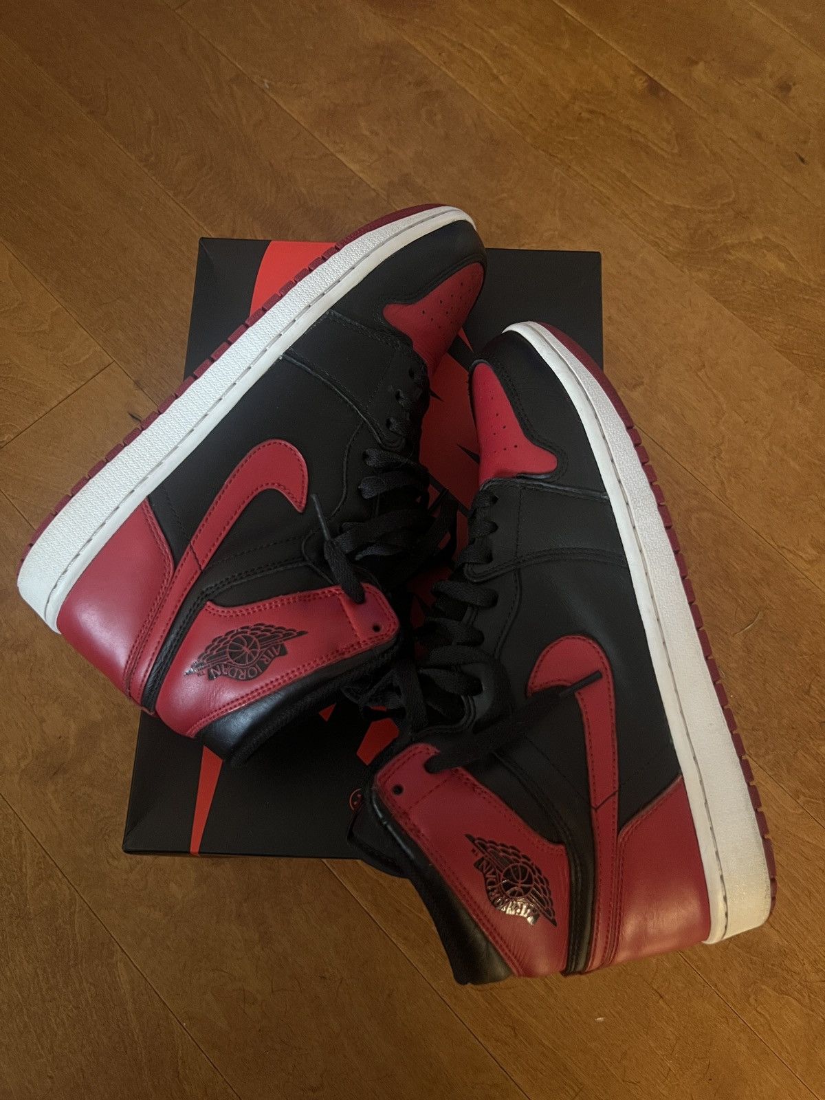 image of Jordan Nike Jordan 1 Retro Bred Shoes in Black, Men's (Size 10)
