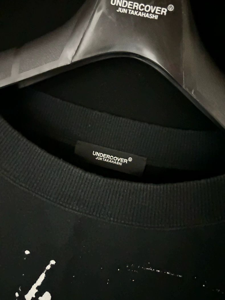 Undercover 19SS crewneck face print sweater