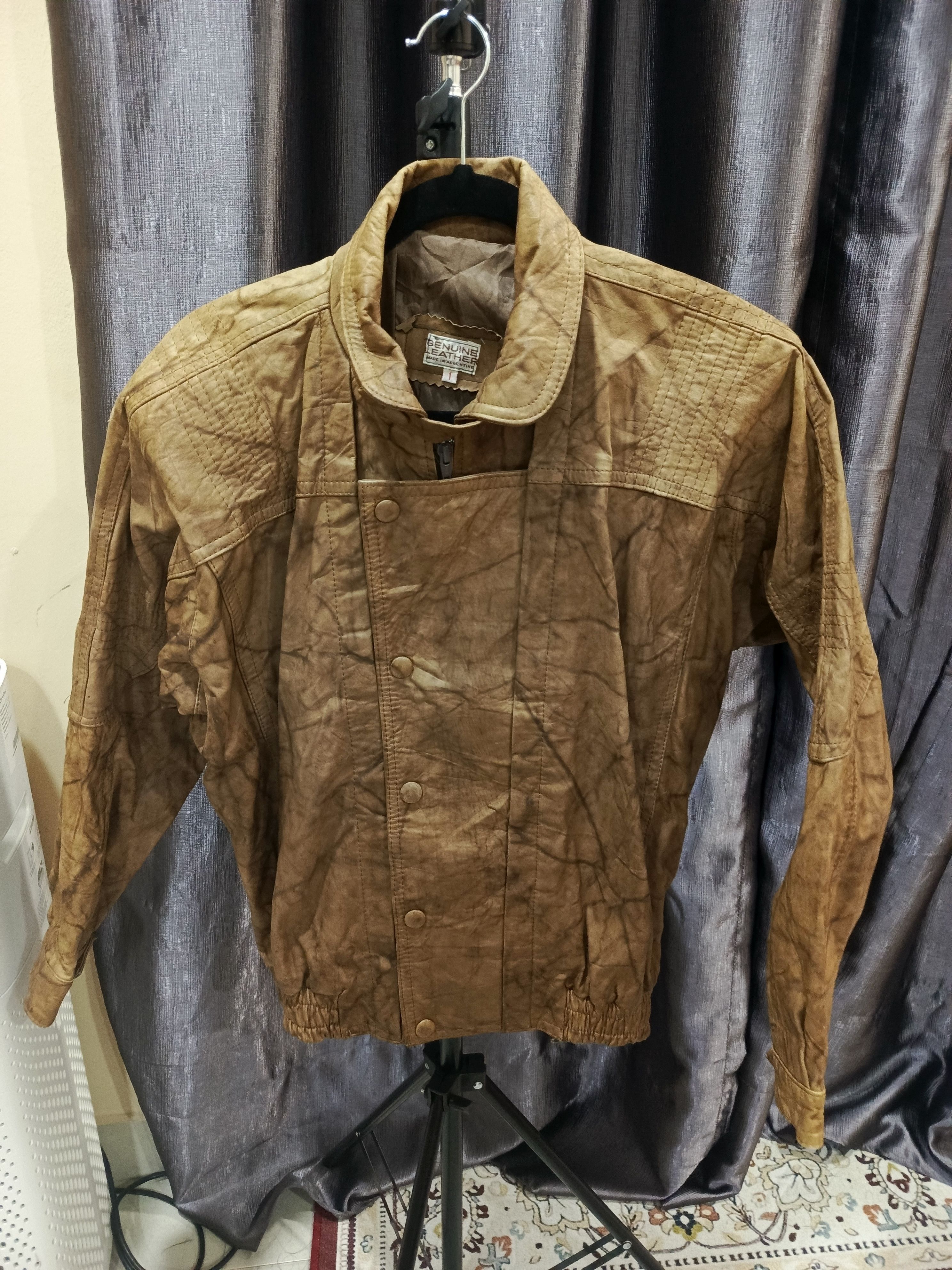 jacket vintage leather jacket likely in a bomber