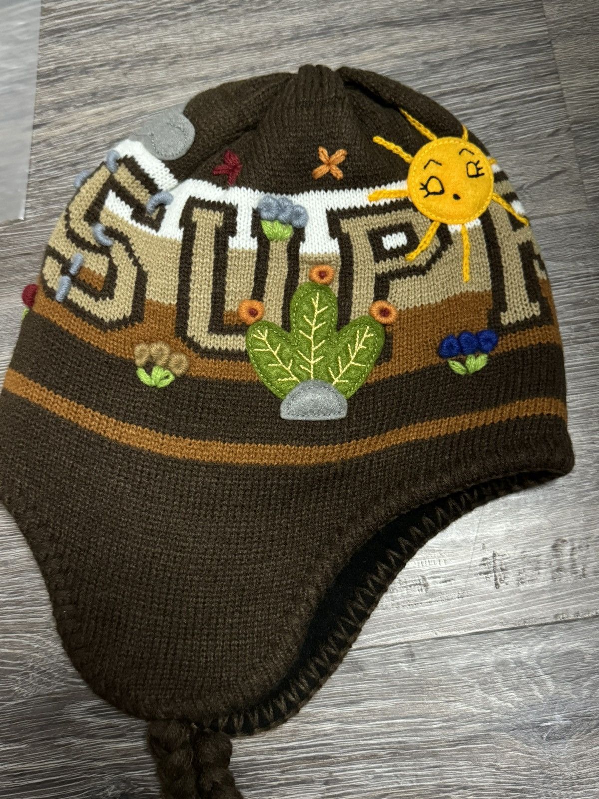 Supreme Supreme felt applique earflap beanie | Grailed