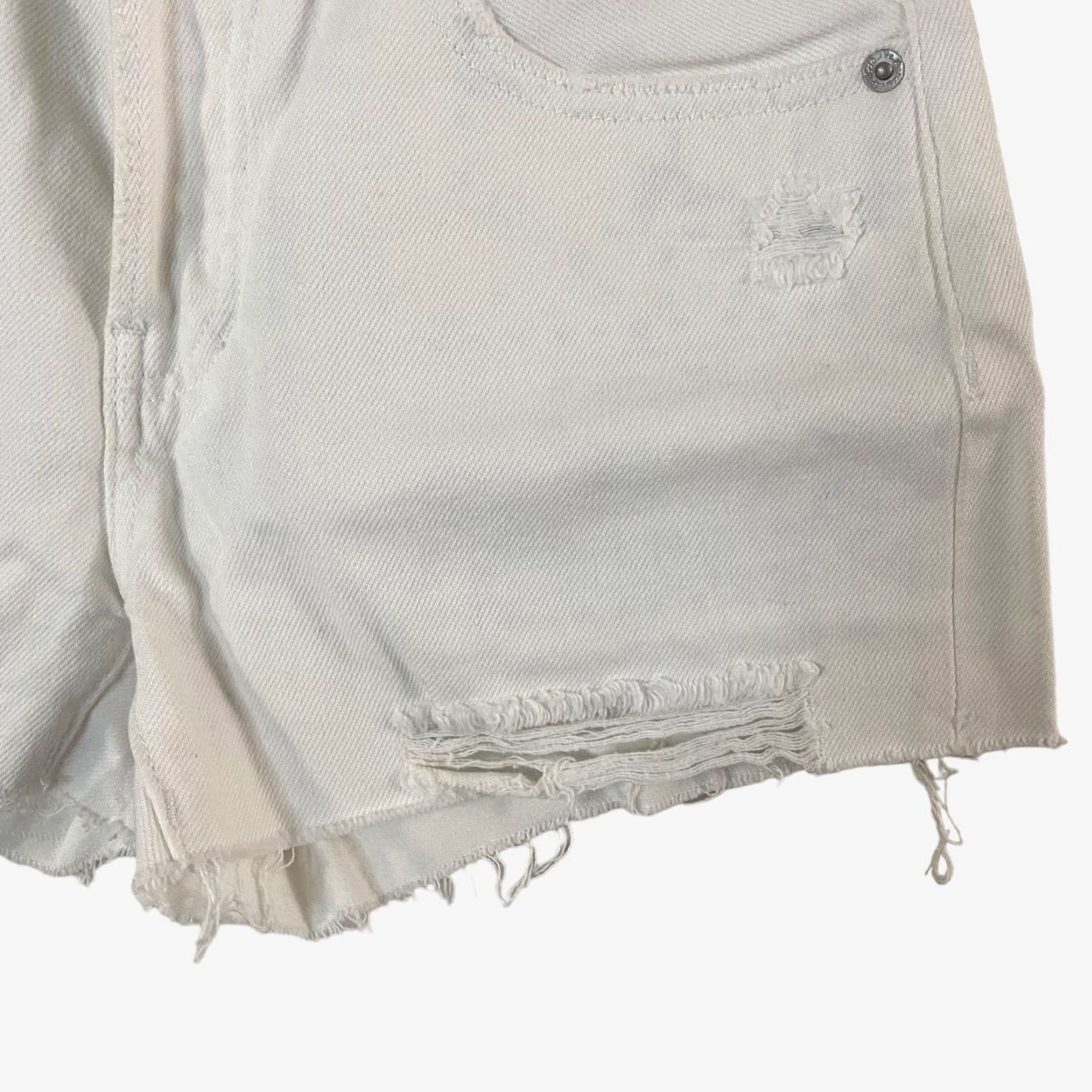 Free People Free People We The Free Jean Shorts Womens 24 White Distressed Raw Hem Cut-Off Button Closure 5-Pocket Denim 100% Cotton Womens Size 42" / US 20 - 6 Thumbnail