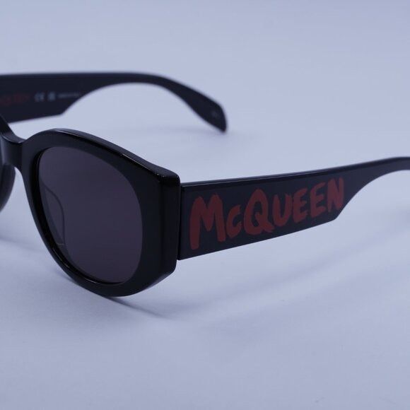 Alexander McQueen Alexander McQueen AM0330S 002 Sunglasses Black Oval Frame Size ONE SIZE - 2 Thumbnail