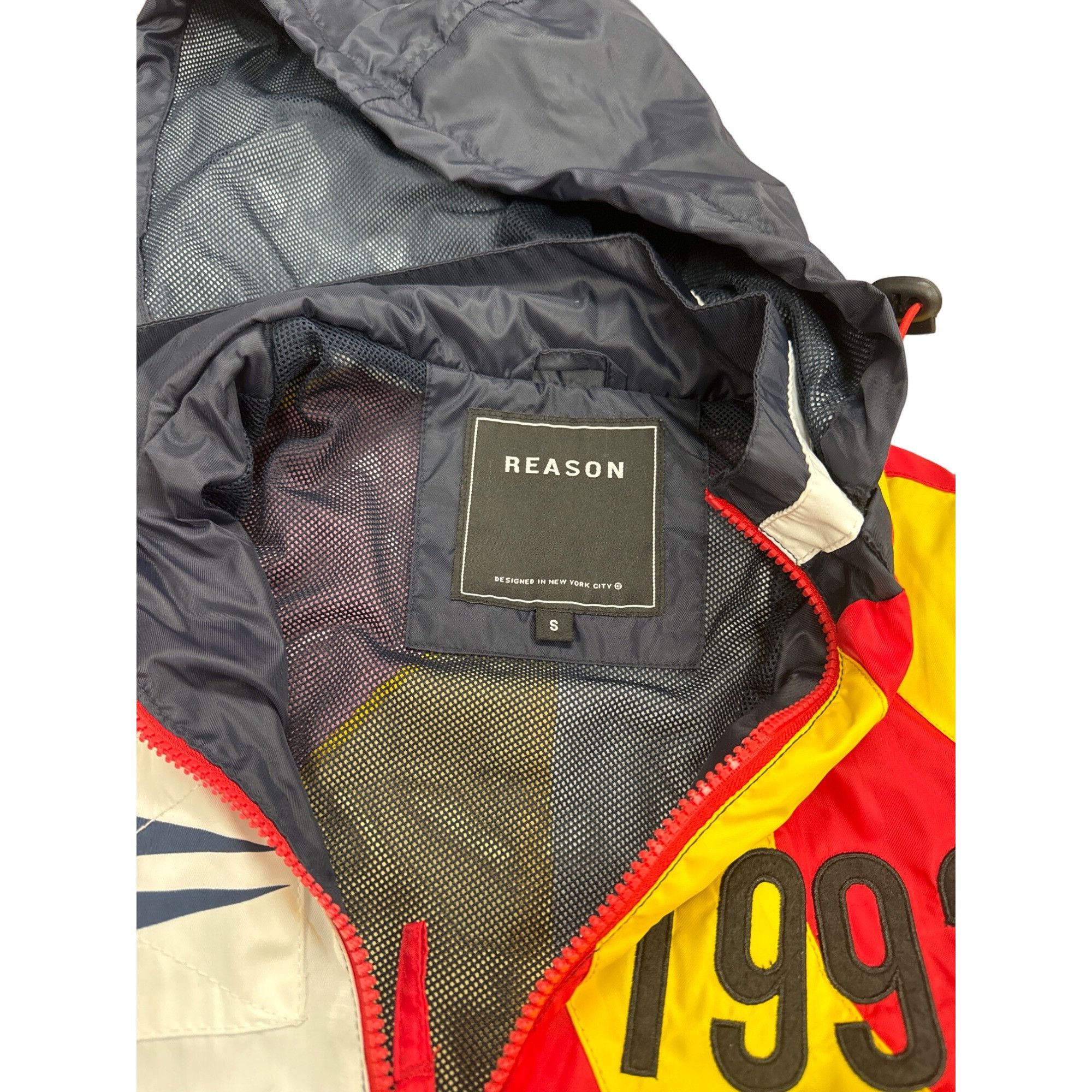 Reason Reason men’s blue red white yellow black windbreaker jacket Size US S / EU 44-46 / 1 - 3 Thumbnail