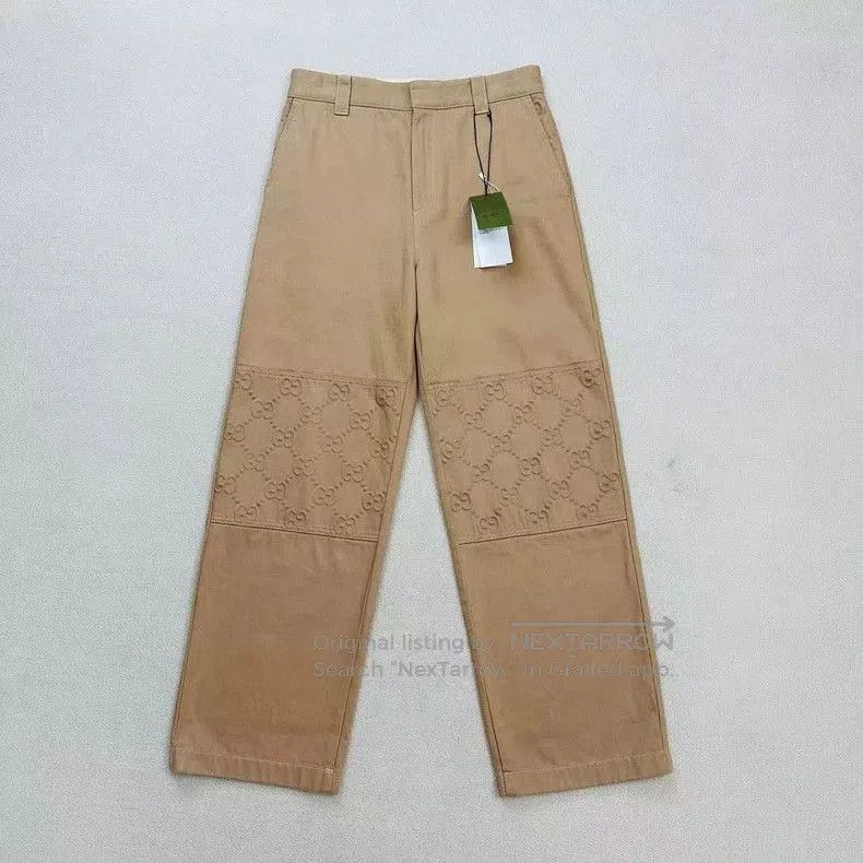 Gucci Embroidered Logo Patchwork Jeans.