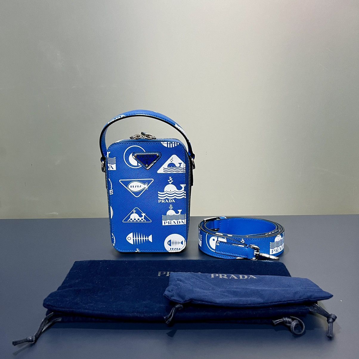 image of Prada Saffiano Whale Brique Vertical Crossbody W/ Strap in Blue, Men's