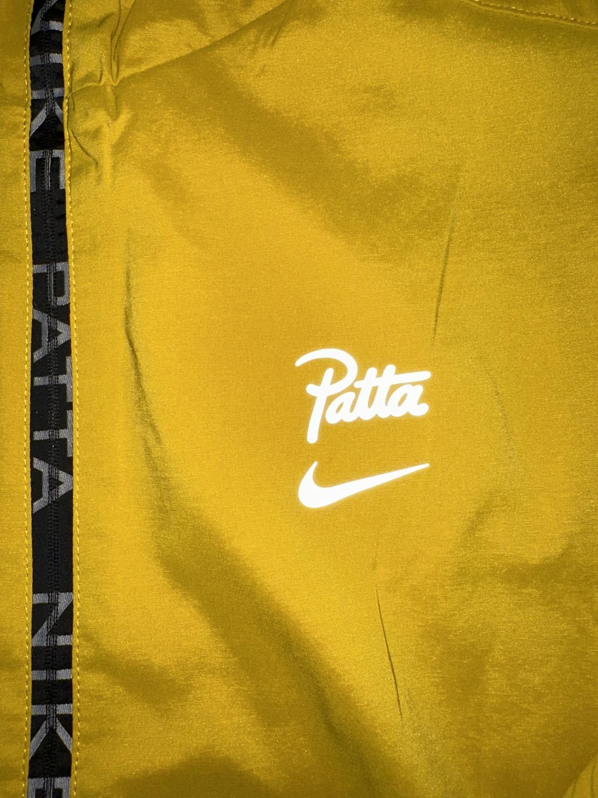 Nike Nike Men’s Patta Running Team Full-Zip Saffron Quartz Jacket Size US M / EU 48-50 / 2 - 5 Thumbnail