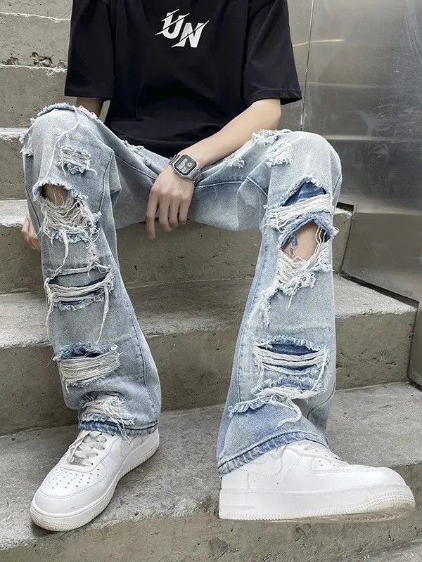 Straight leg washed ripped jeans