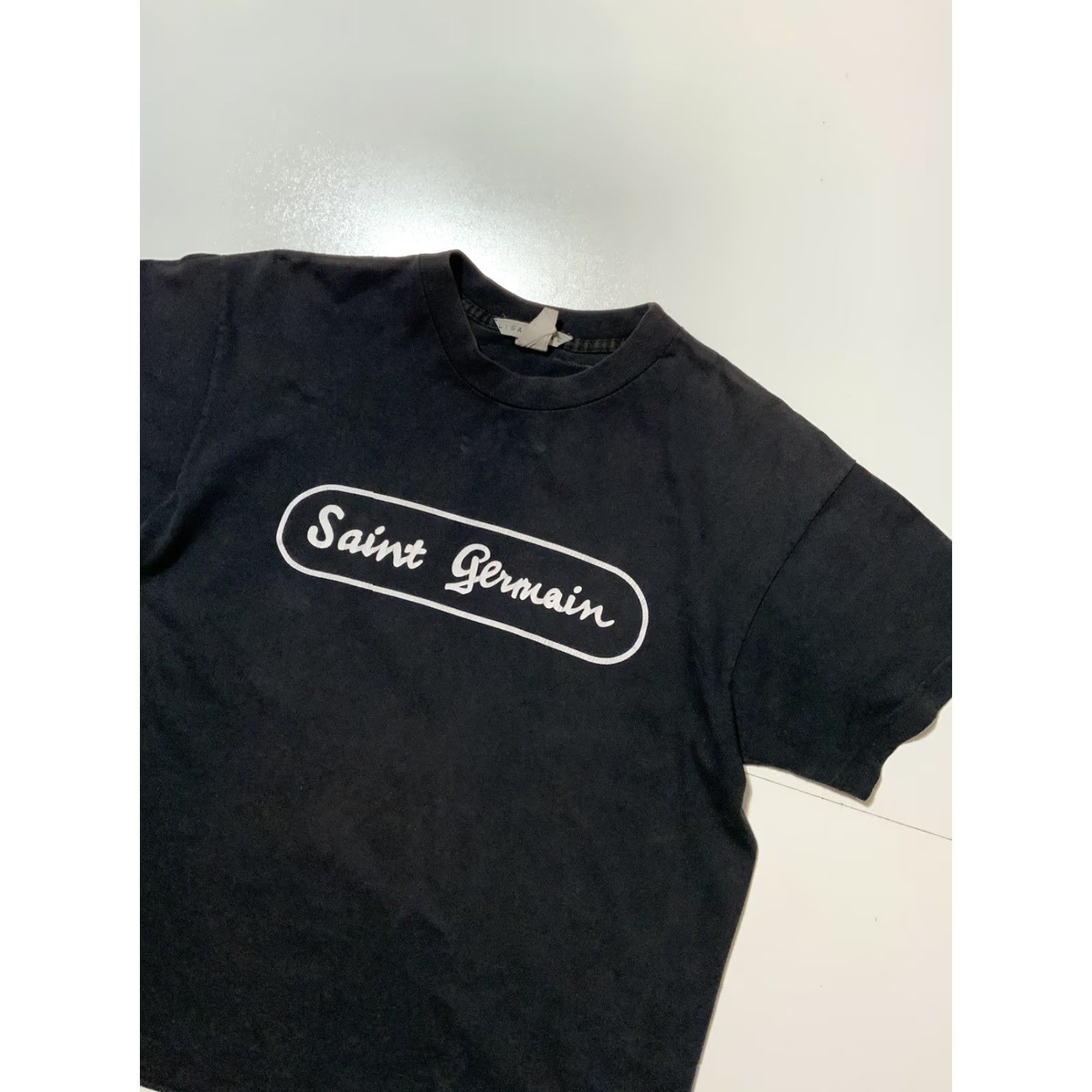 Vintage VINTAGE 90s Lisa Deane Saint Germain Black Faded Graphic S/S Crew T-Shirt Sz. L Men Shirt Size US L / EU 52-54 / 3 - 4 Thumbnail