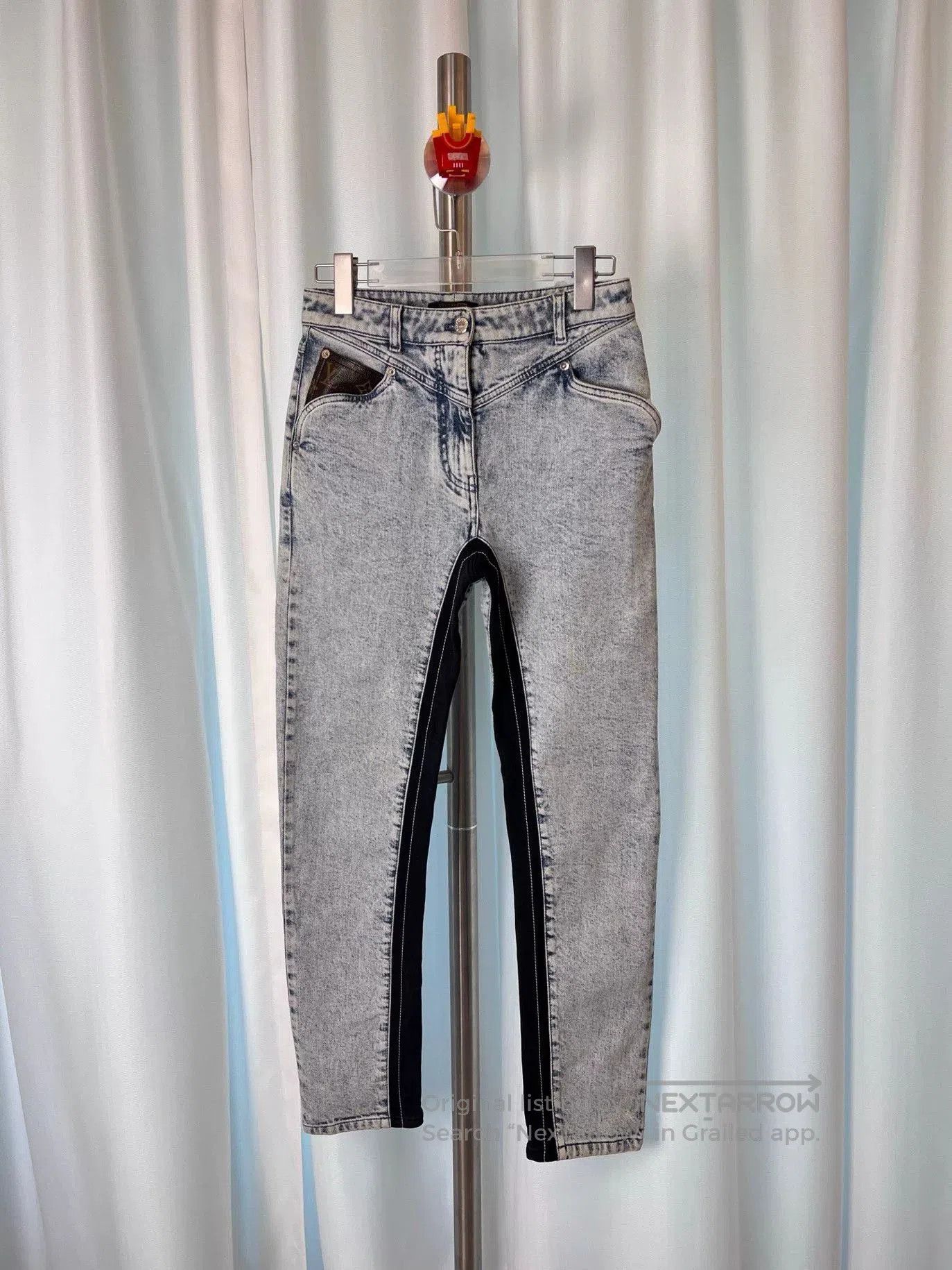 Louis Vuitton Monogram Light Wash Jeans.