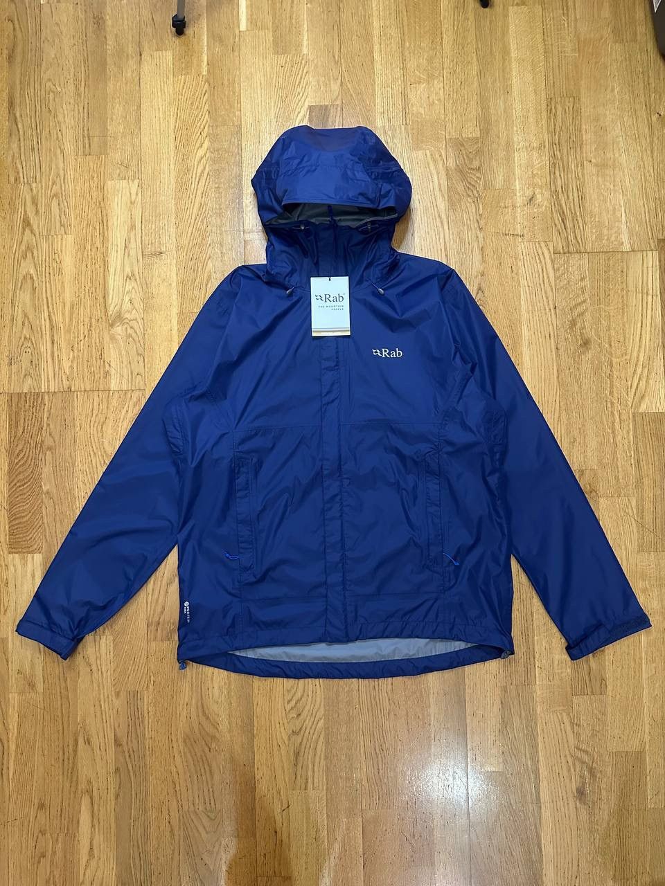 image of Arcteryx x Outdoor Life Rab Downpour Jacket Twilight - New With Tags in Blue, Men's (Size XL)