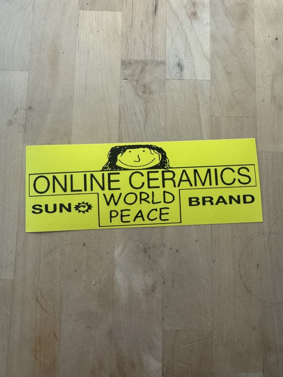 Online Ceramics Online Ceramics World Peace Sun Brand XL Bumper Sticker Size ONE SIZE - 1 Thumbnail