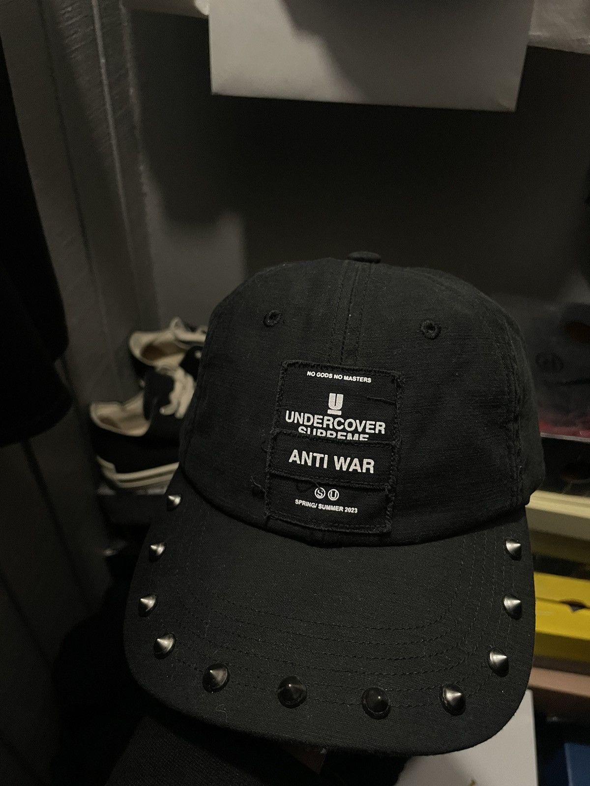 image of Anti War Supreme x Undercover Hat in Black, Men's