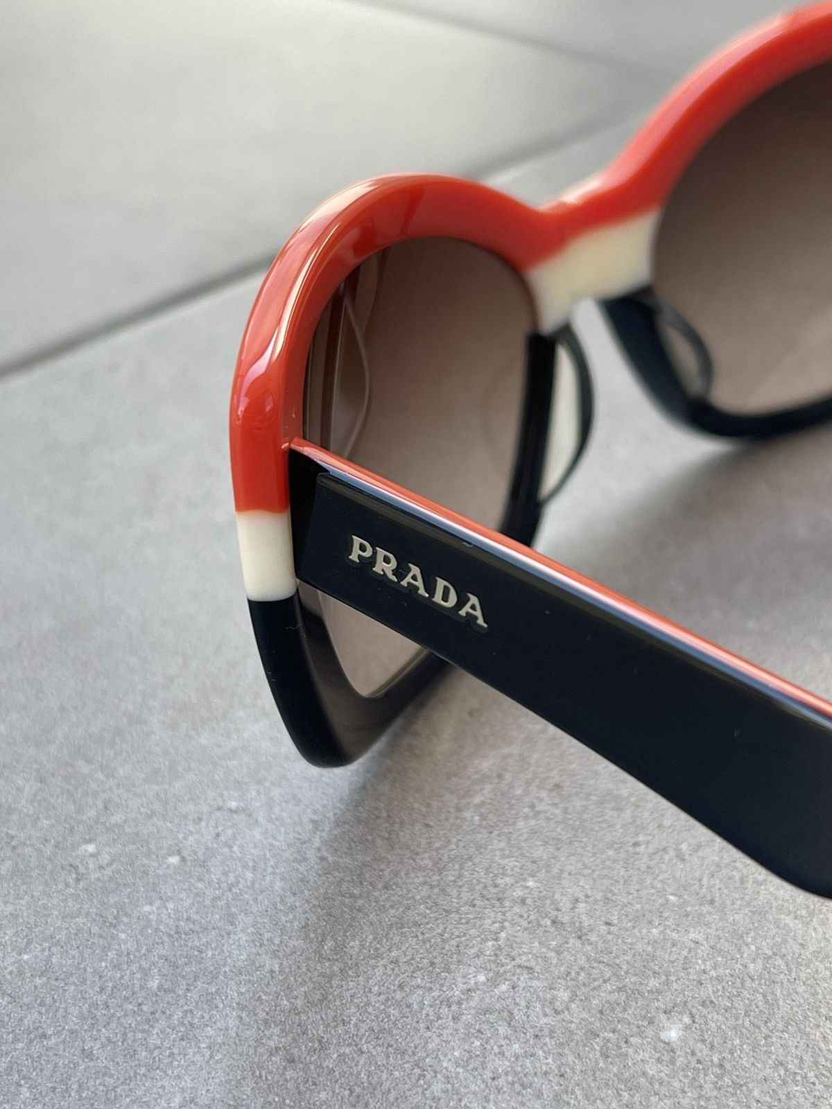 Prada Prada SPR 03N DAN-6S1 Black White Red Sunglasses Size ONE SIZE - 7 Thumbnail