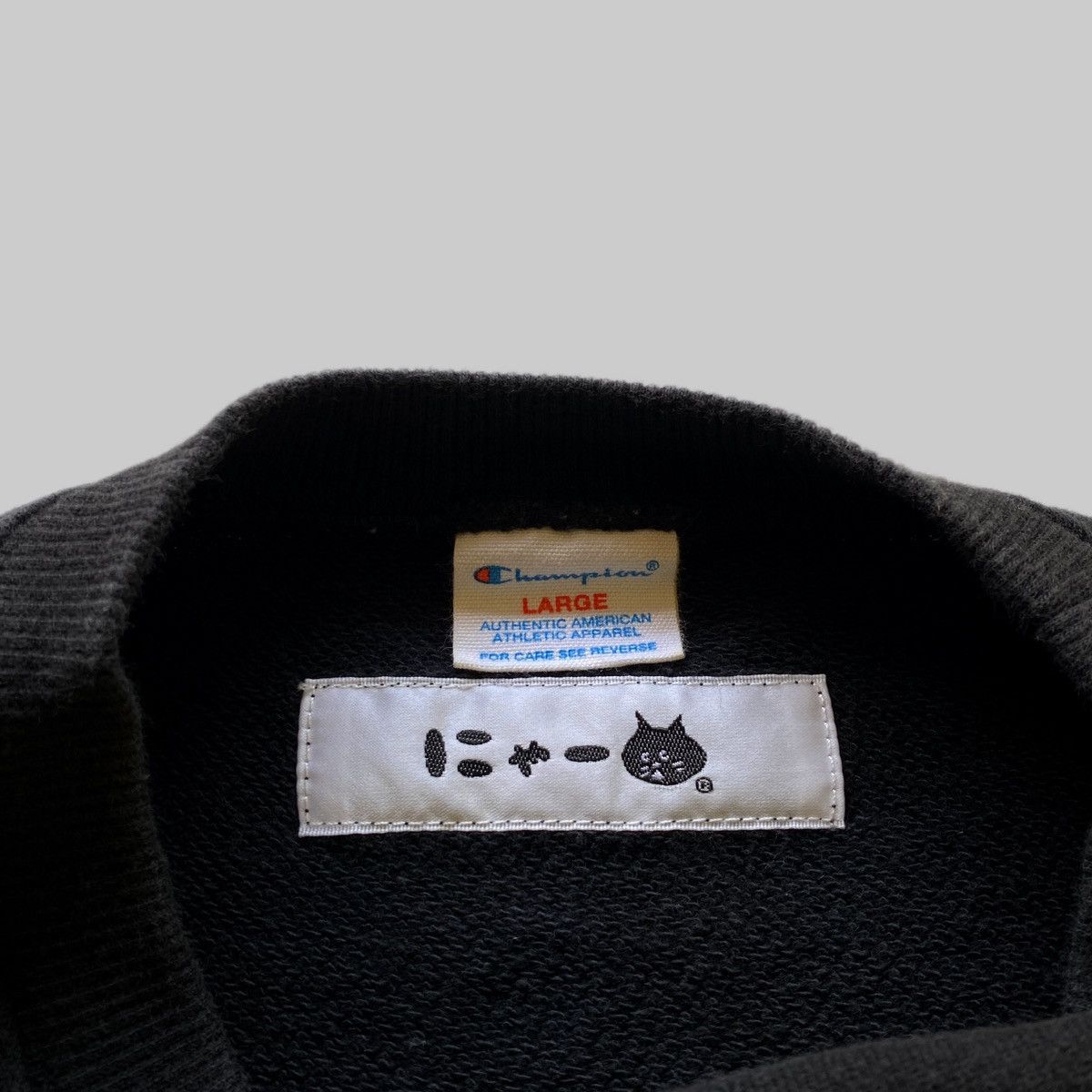 Champion × Ne-Net VTG Ne-Net x Champion “Nya Rides on a Bicycle” Size US L / EU 52-54 / 3 - 3 Thumbnail