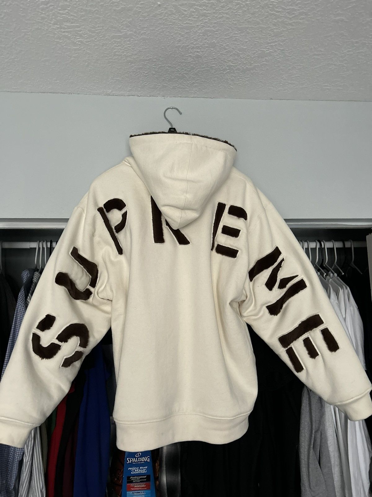 Spread logo hooded clearance sweatshirt