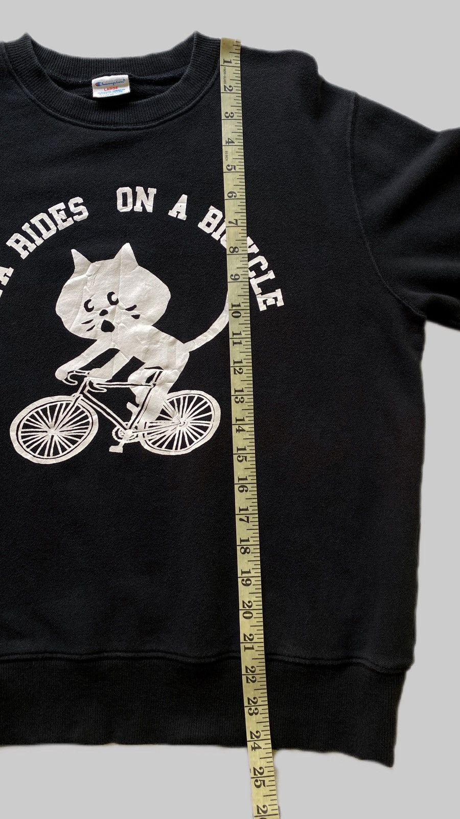 Champion × Ne-Net VTG Ne-Net x Champion “Nya Rides on a Bicycle” Size US L / EU 52-54 / 3 - 6 Thumbnail