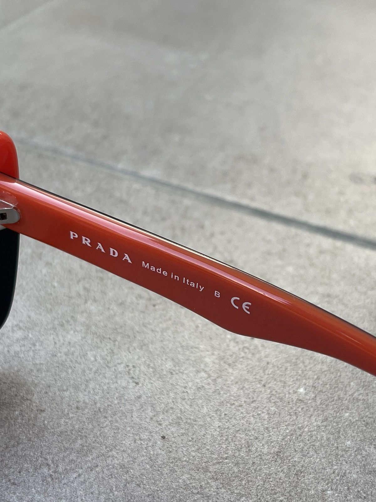Prada Prada SPR 03N DAN-6S1 Black White Red Sunglasses Size ONE SIZE - 11 Thumbnail