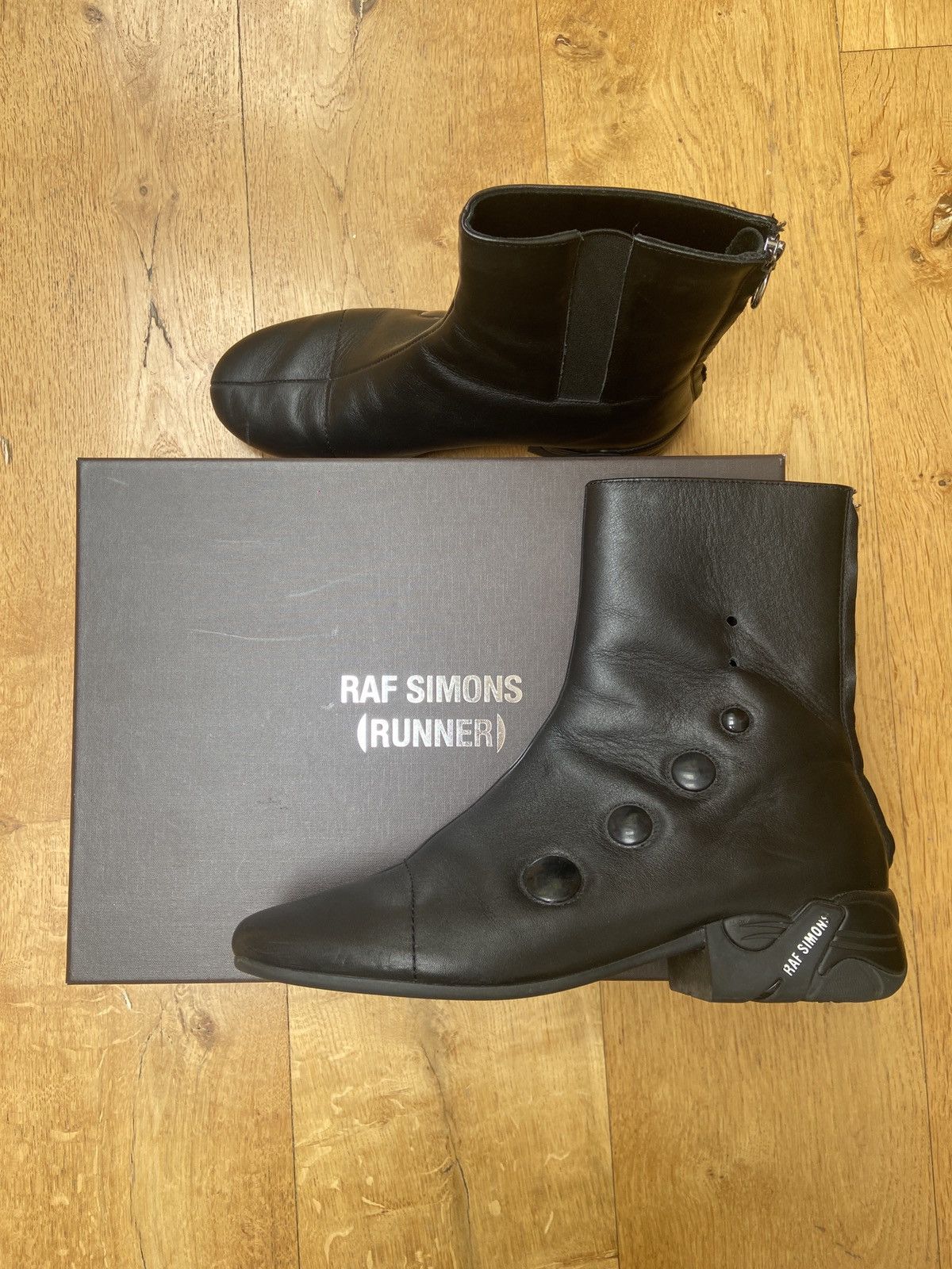 【RAF SIMONS】solaris high レザー ankle ブーツ Raf Simons Solaris-21 45mm Ankle Boots | Black | FARFETCH